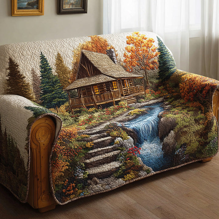 Quilted sofa cover with amber forest – Louise London