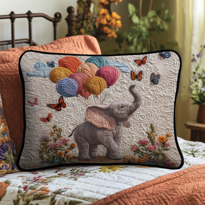 Quilted pillow cover with colorful balloons by Louise London