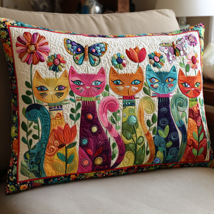 Quilted cushion cover with colorful pattern by Louise London