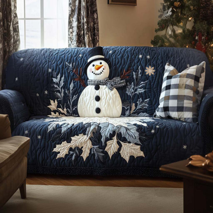 Quilted sofa cover with Christmas elf – Louise London