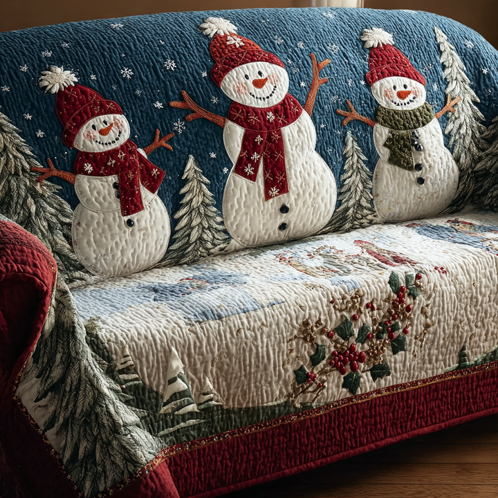 Quilted sofa cover with smiling snowman – Louise London