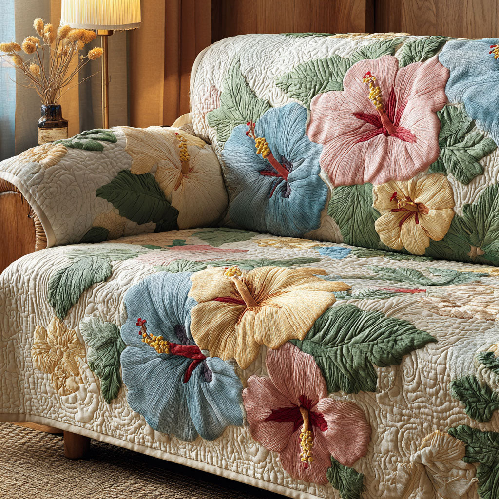 Quilted sofa cover with hibiscus – Louise London