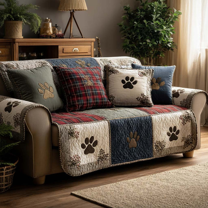 Quilted sofa cover with paw prints