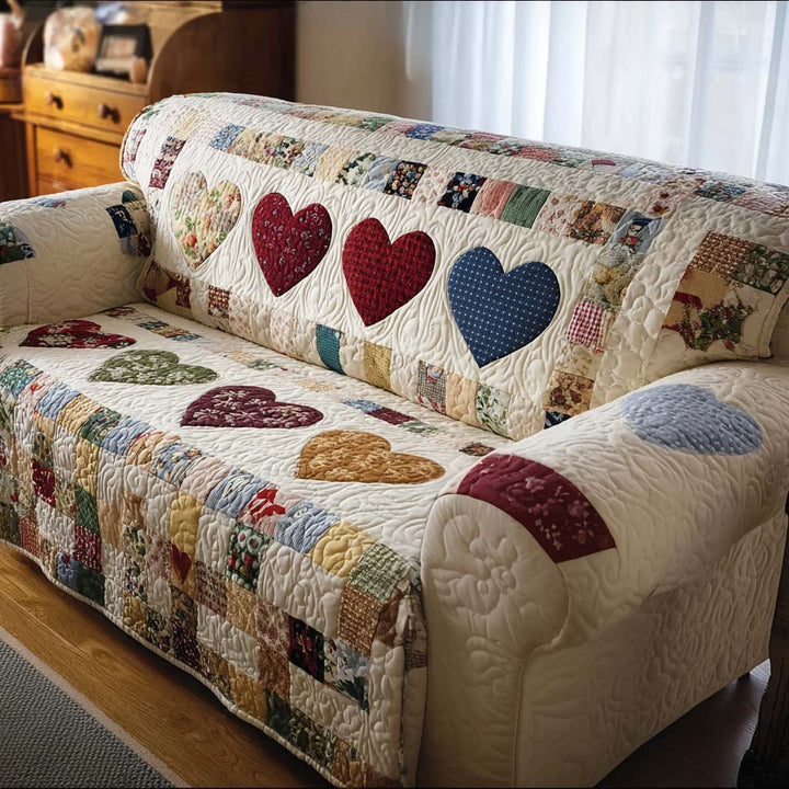 Quilted sofa cover with decorative pattern – Louise London
