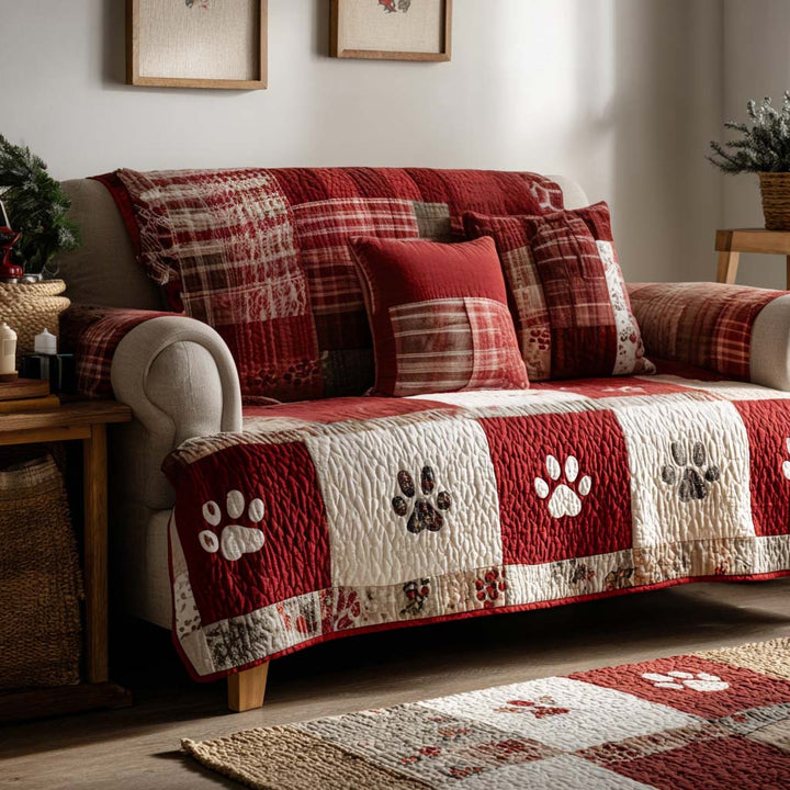 Quilted sofa cover with festive paws – Louise London