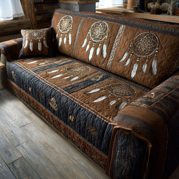 Quilted sofa cover with nocturnal tribal pattern – Louise London