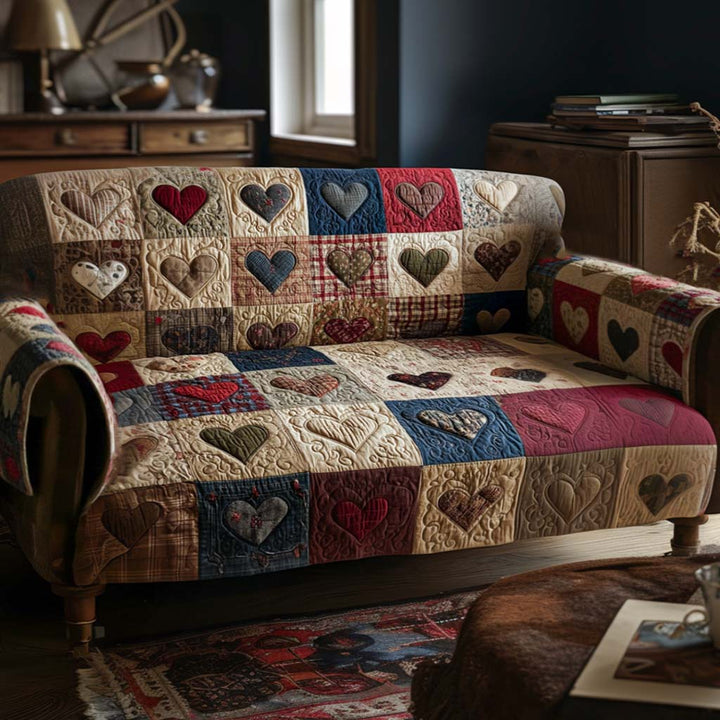 Quilted sofa cover with warm hearts – Louise London