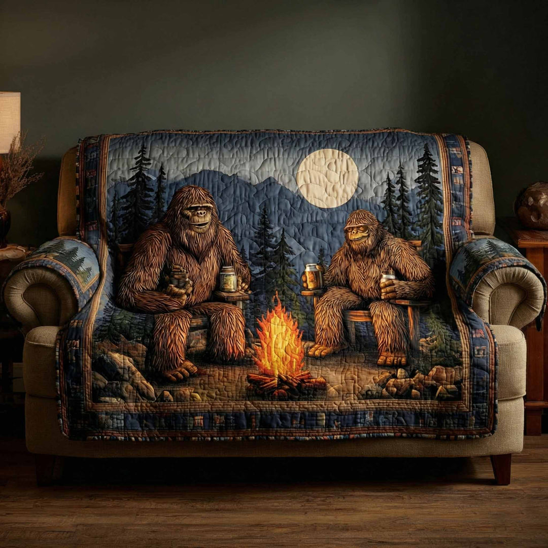 Quilted sofa cover with woodland pattern – Louise London