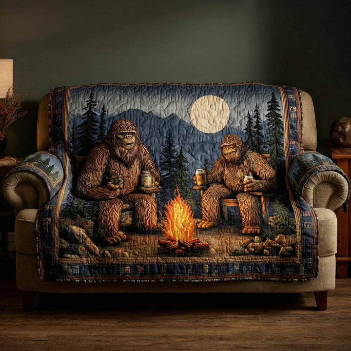 Quilted sofa cover with woodland pattern – Louise London